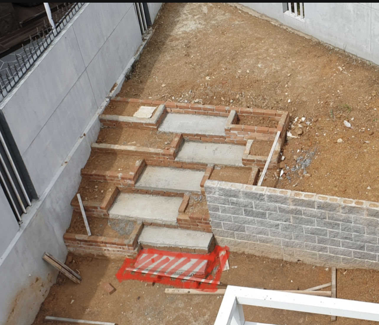 Hardscape stonework and retaining wall construction for a Penang garden project, by GP FloraL