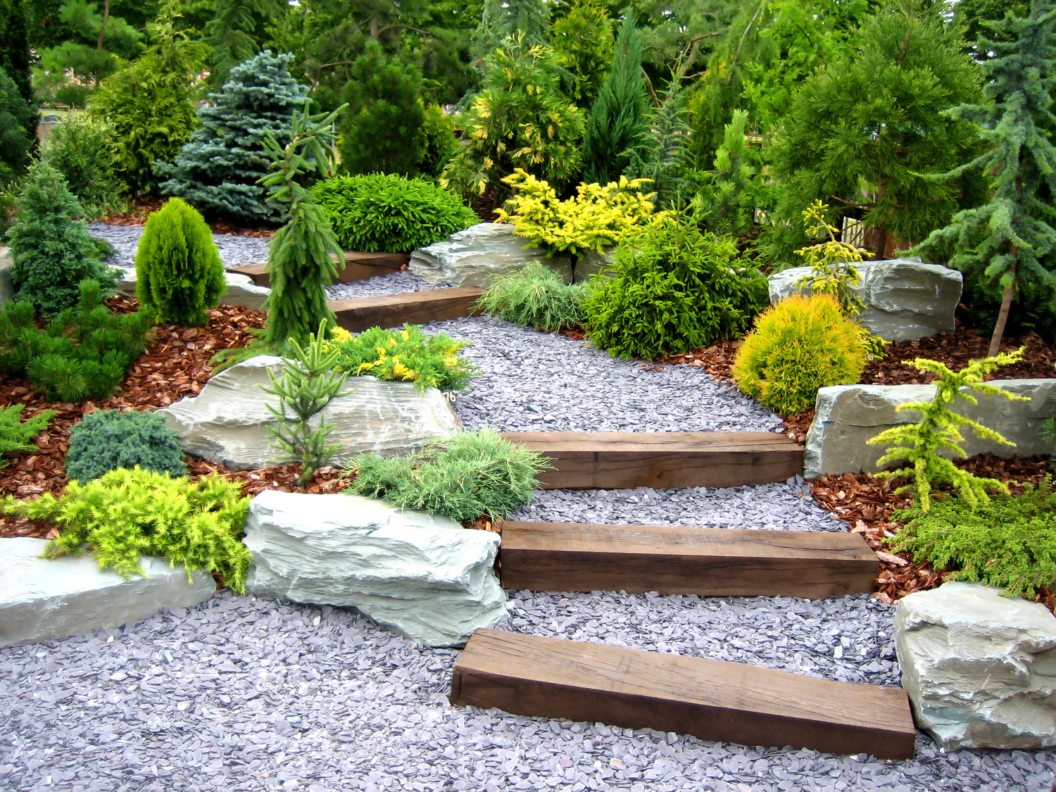 Rock garden with slate path, stone steps and conifers — GP FloraL landscaping, Penang