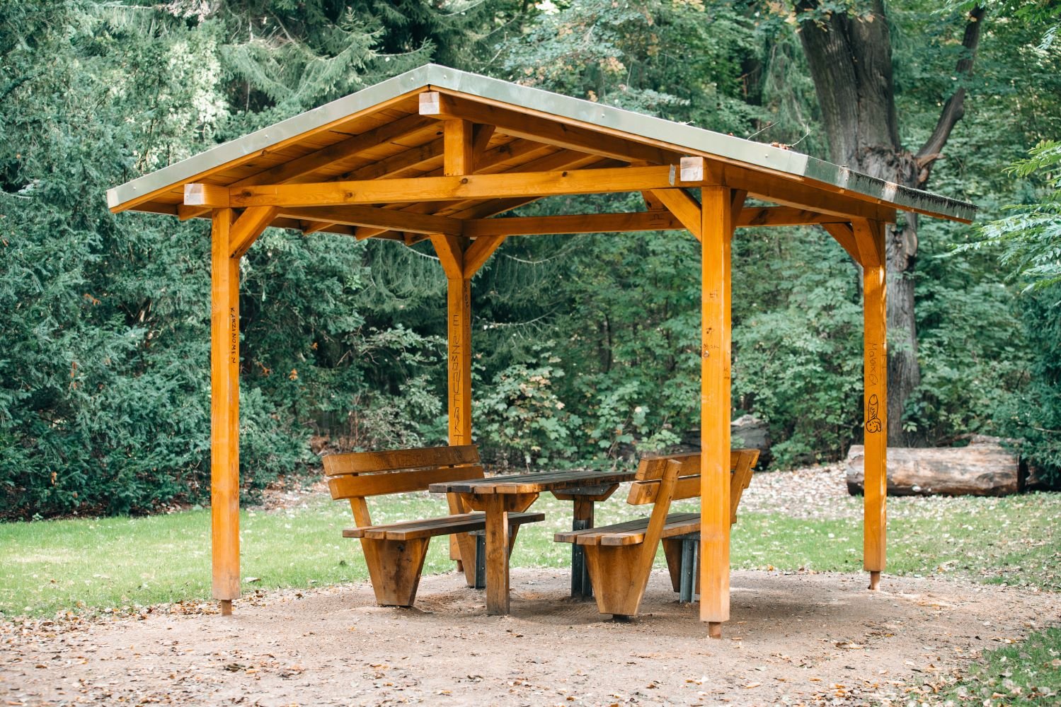 Timber gazebo shelter with picnic bench seating, built to stay looking good with regular maintenance, by GP FloraL