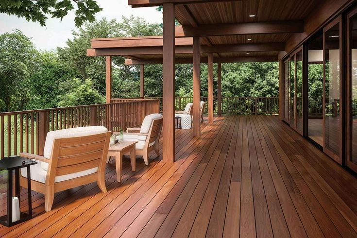 Covered timber pergola and hardwood deck with lounge seating overlooking greenery, built by GP FloraL in Penang
