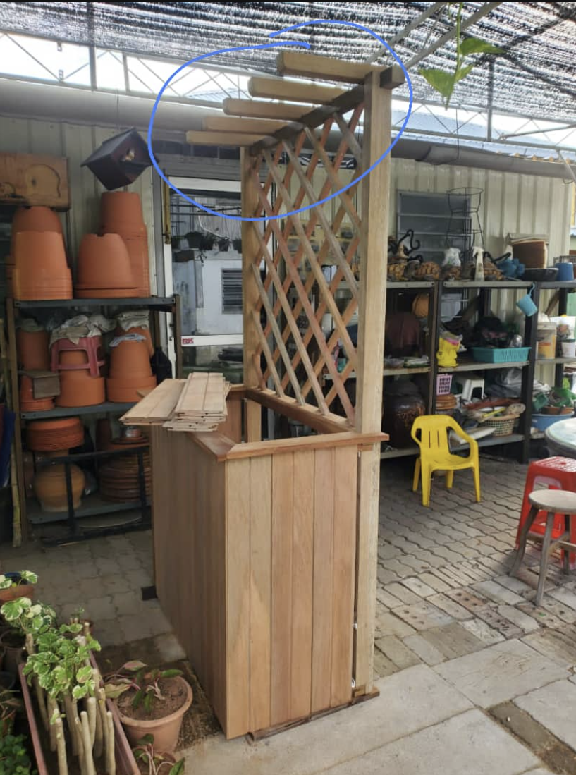 Timber planter box with diagonal lattice trellis screen and pergola-style arbour top, built by GP FloraL in Penang