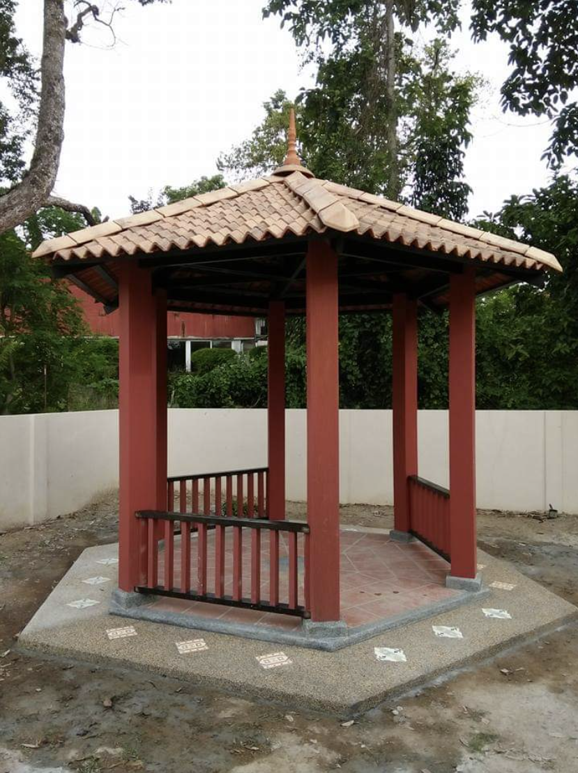 Timber gazebo with clay-tile roof and terracotta posts, built by GP FloraL in Penang